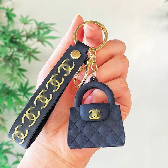 Wholesale Cartoon keychain silicone mini bag pendant car keychain fashion gift