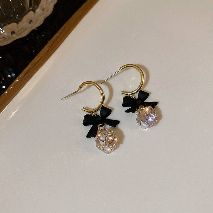 Wholesale Silver needle bow three-dimensional spherical earrings versatile retro earrings