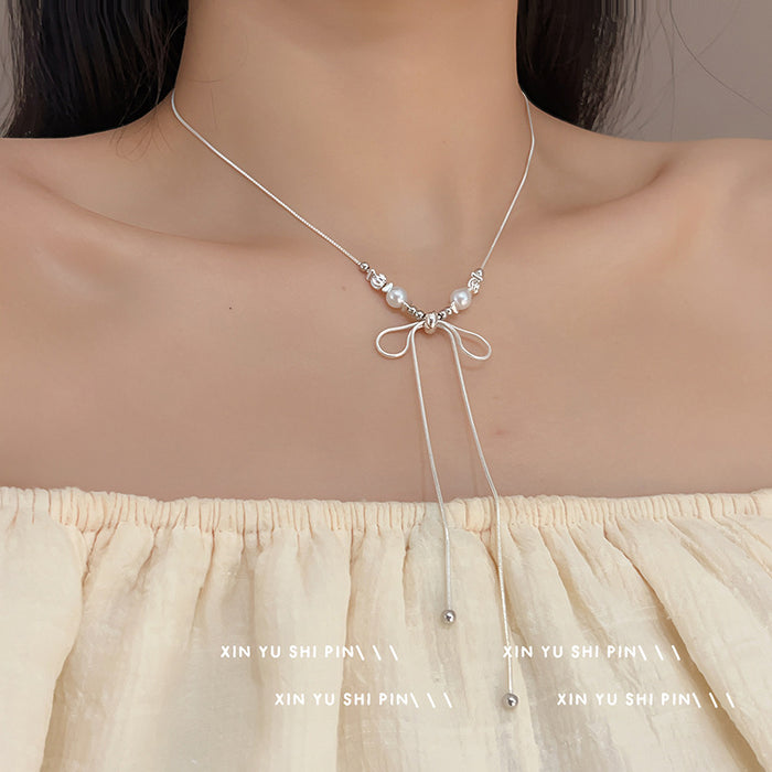 Wholesale Super beautiful bow long necklace, light luxury temperament, niche collarbone chain, fashionable and versatile necklace