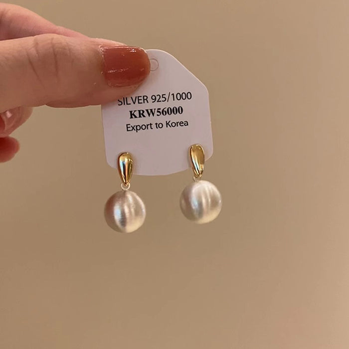 Wholesale The niche frosted brushed metal ball earrings have a simple and high-end temperament