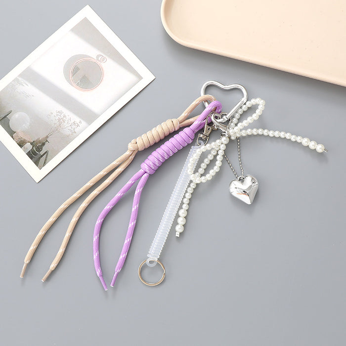 Wholesale Leather bow heart pendant luggage keychain lanyard accessories single buckle tassel pendant accessories