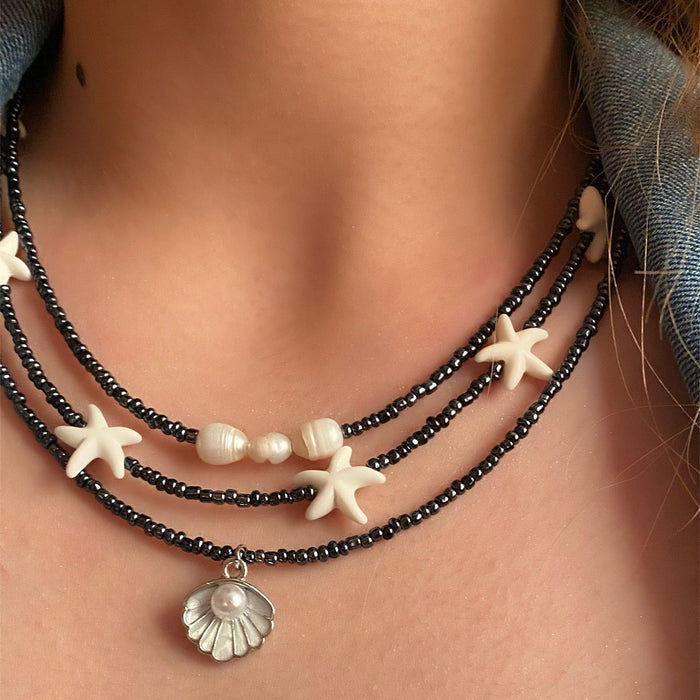 Wholesale New stacked black bead starfish necklace shell pendant necklace, personalized and fashionable collarbone chain