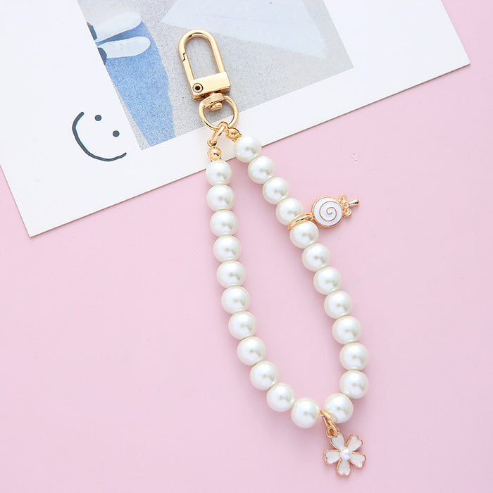 Wholesale Retro Pearl keychain pendant alloy mobile phone chain bag pendant