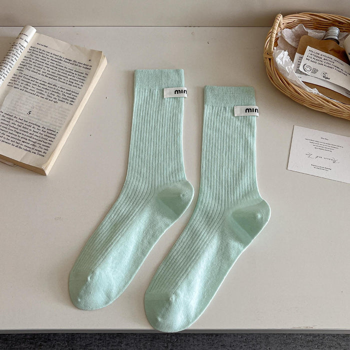 Wholesale Medium length socks with solid color letters, fabric labels, stacked socks, thin cotton socks, sweat absorbing and breathable