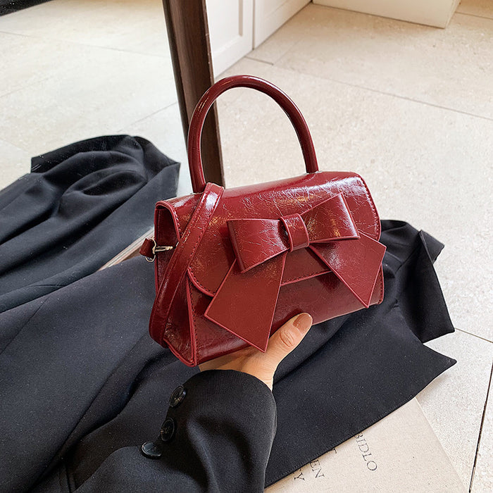 Wholesale New casual, personalized, fashionable bow shoulder bag, hand-held small square bag, minimalist crossbody bag