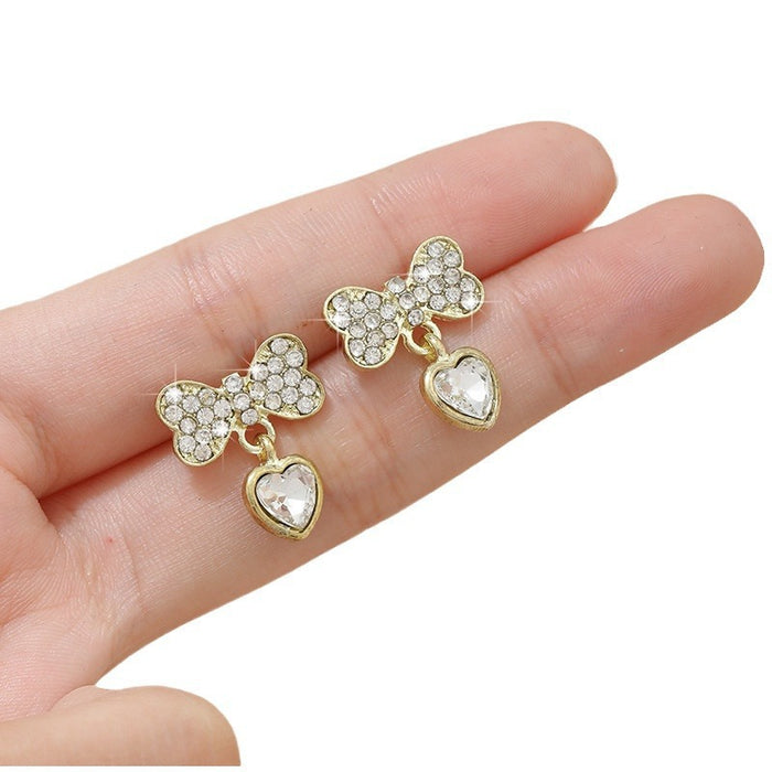 Wholesale Fashionable alloy personalized bow, zircon heart earrings, simple earrings, silver needle earrings