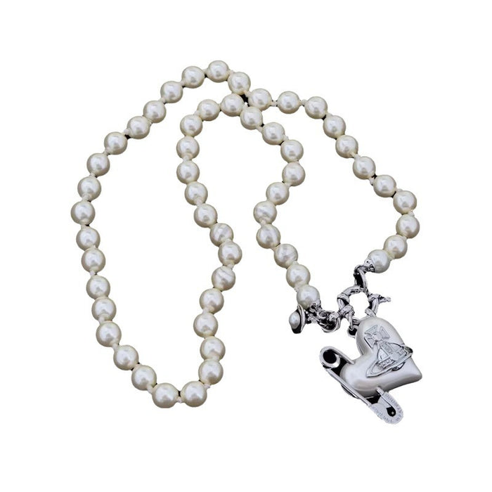 Wholesale Resin crooked heart-shaped pin, pearl necklace, light luxury temperament