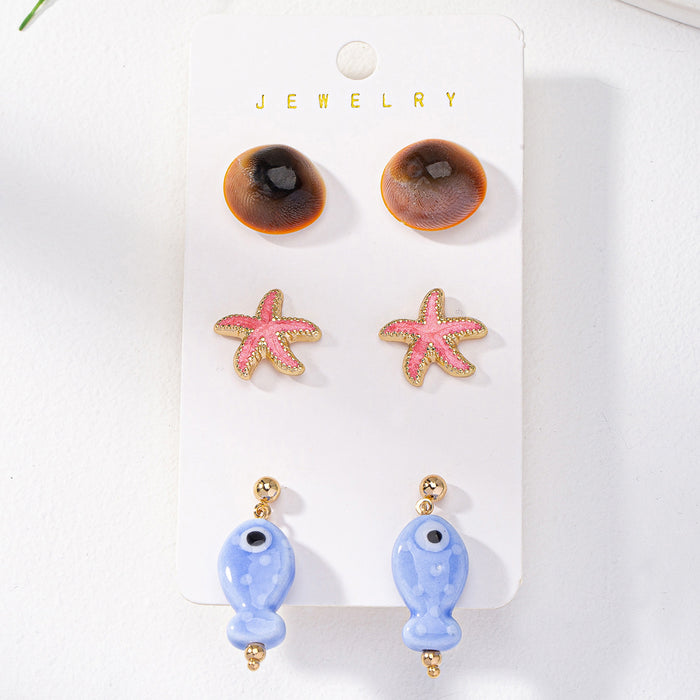Wholesale Qingdao Daiwei European and American Ins Popular Jewelry Cross-Border E-Commerce Supply 3 Pairs of Shell Starfish Ceramic Fish Earrings Set