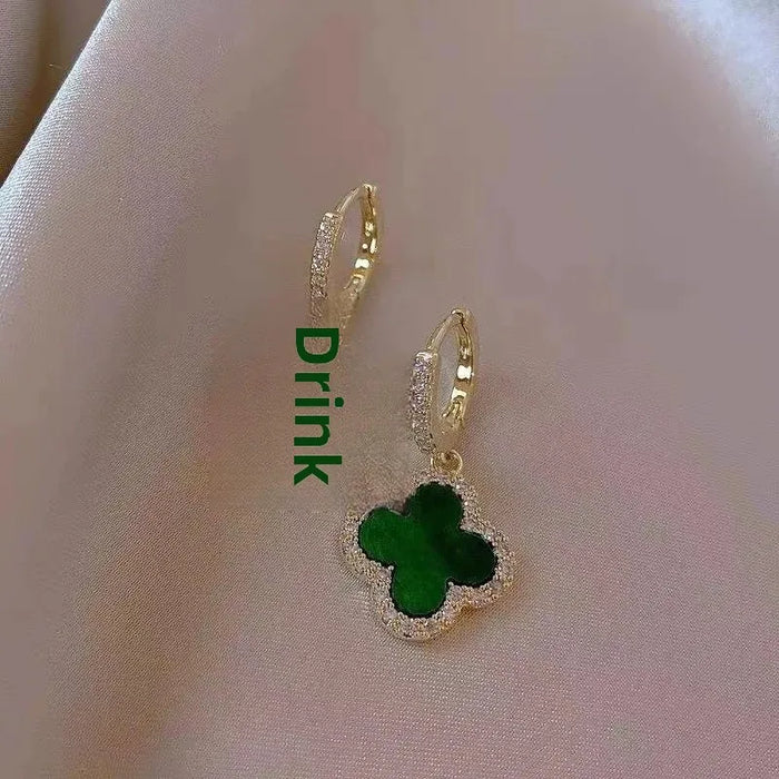 Wholesale Four leaf clover earrings, women's high-end classic earrings, copper gold-plated light luxury sparkling diamond zircon earrings