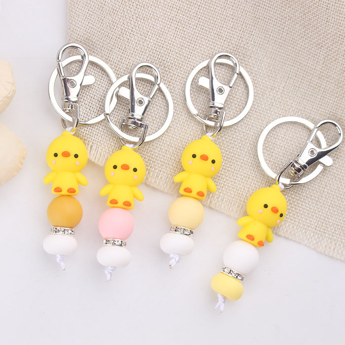 Wholesale Santa Cartoon Little Yellow Duck Silicone Beaded Keychain JDC-KC-GuangTian032