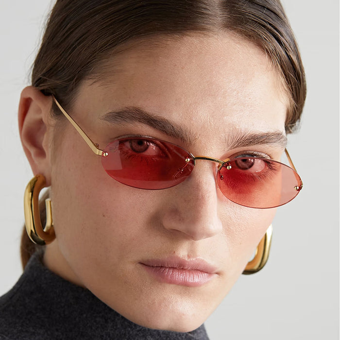 Wholesale Frameless metal oval sunglasses, fashionable and personalized small frame sunglasses