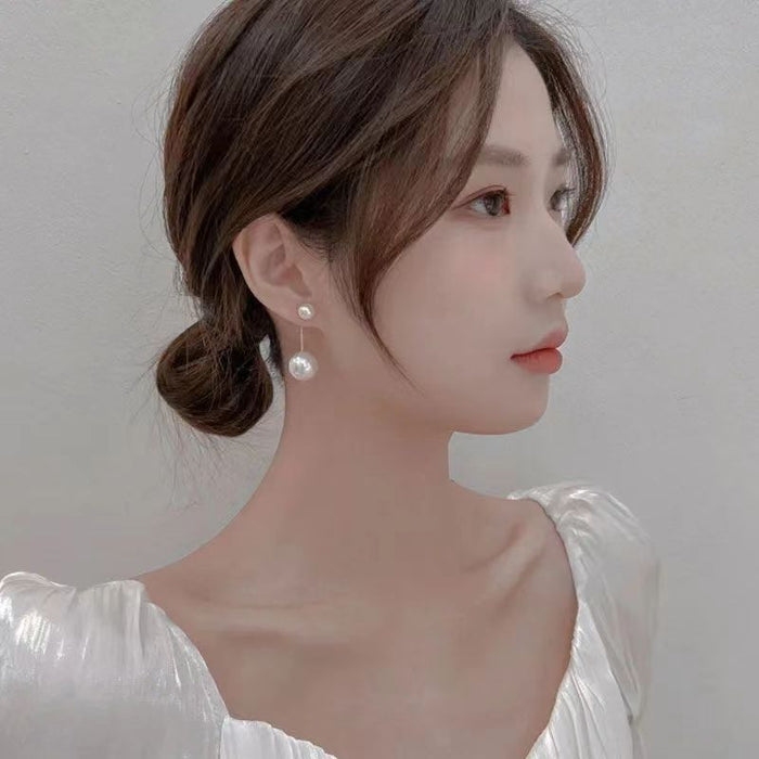 Wholesale Imitation pearl earrings for women tassel earrings long face slimming earrings