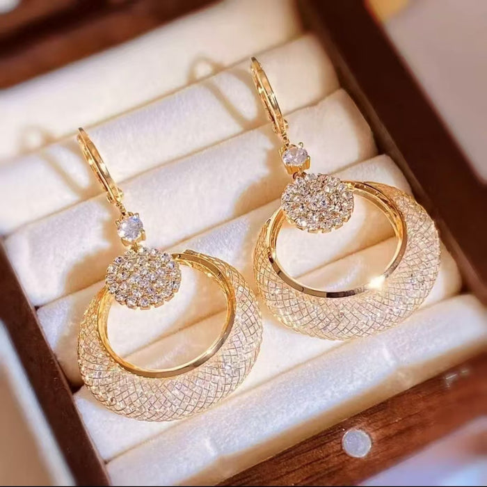 Wholesale New temperament mesh crystal cat eye stone long earrings, light luxury, high-end, personalized ear loops, fashionable and versatile