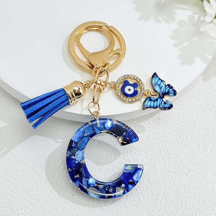 Wholesale Royal Blue 26 Letter Keychain with Evil Eye Butterfly Tassel Pendant