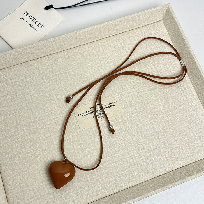 Wholesale Love pendant necklace, long leather rope adjustable sweater chain, high-end sweatshirt accessory