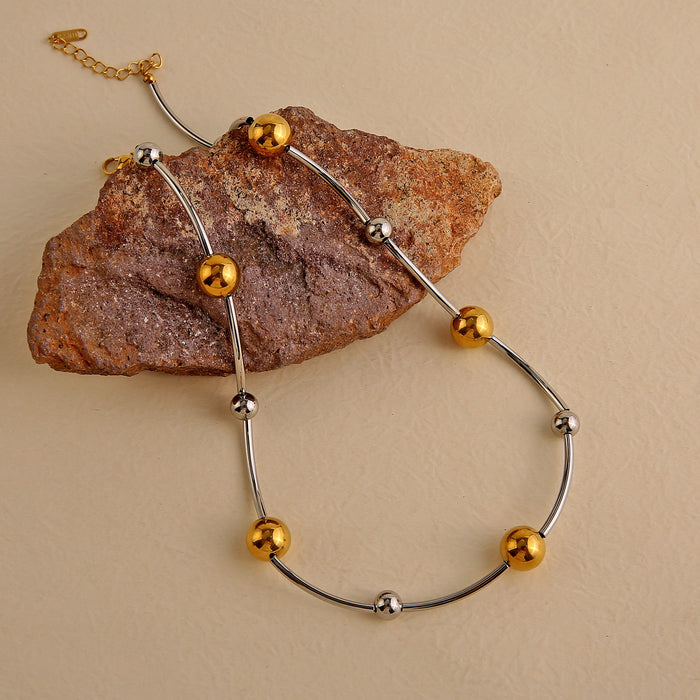 Wholesale Original design: Full body stainless steel gold and silver dual color necklace with a light luxury and high-end feel. Large ball color blocked necklace