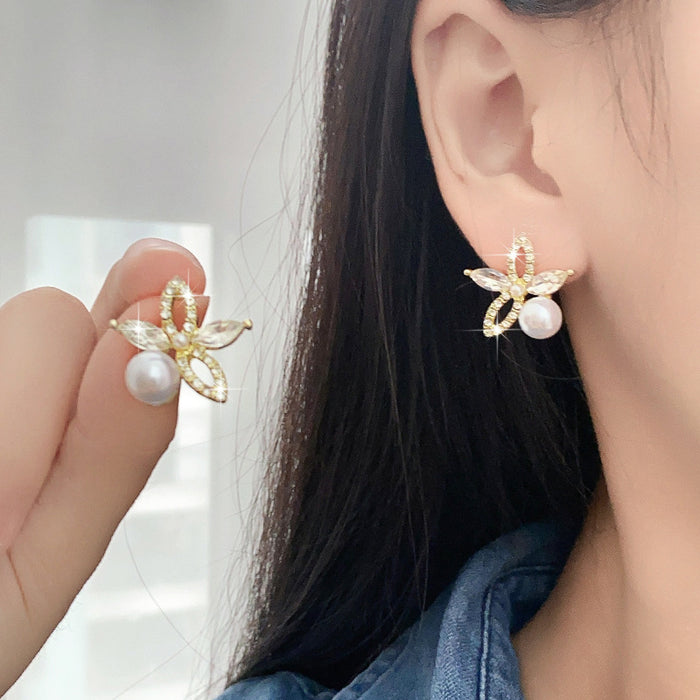 Wholesale Fashionable pearl studded diamond light luxury starfish earrings with versatile temperament, exquisite and niche earrings