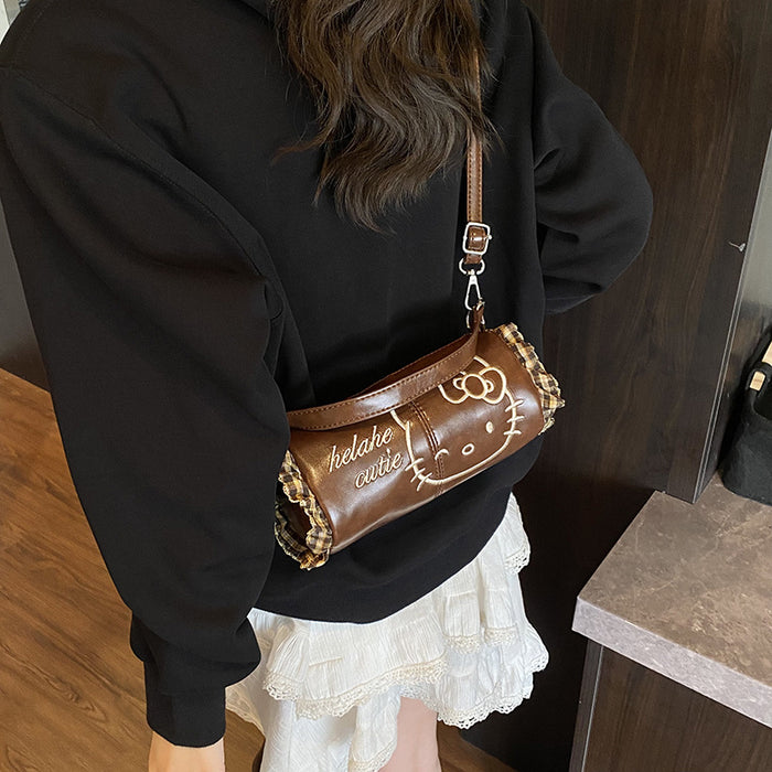 Wholesale Cute cartoon embroidered shoulder bags with a handle.