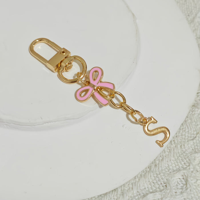 Wholesale Pink bow A-Z keychain alloy accessory