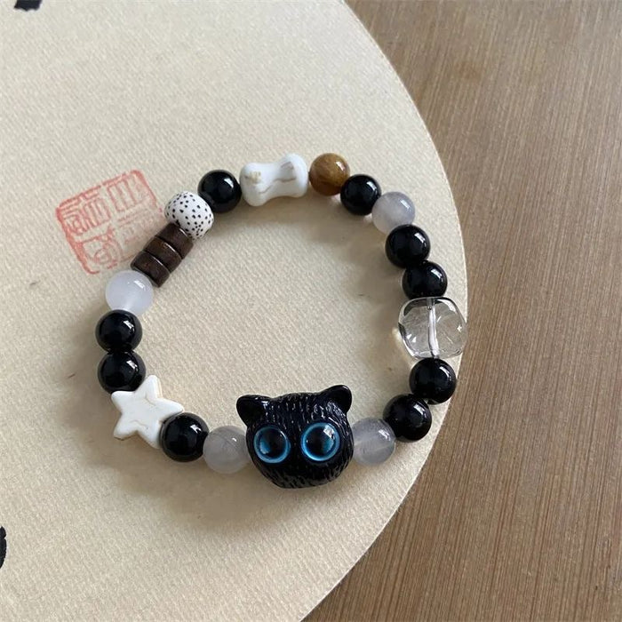 Wholesale Cat ceramic woven rope bracelet with niche design and colorful tassel bracelet accessories