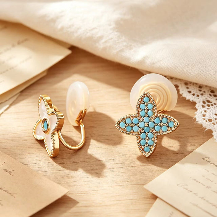 Wholesale Trendy Natural Shell Four Leaf Clover Asymmetrical Clip On Earrings For Women Electroplated Copper Fashion Jewelry Accessory