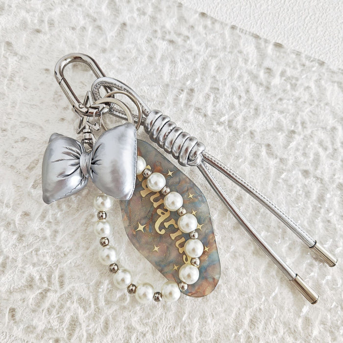 Wholesale Simple Bow Woven Leather Rope Pearl Chain Hanging Keychain