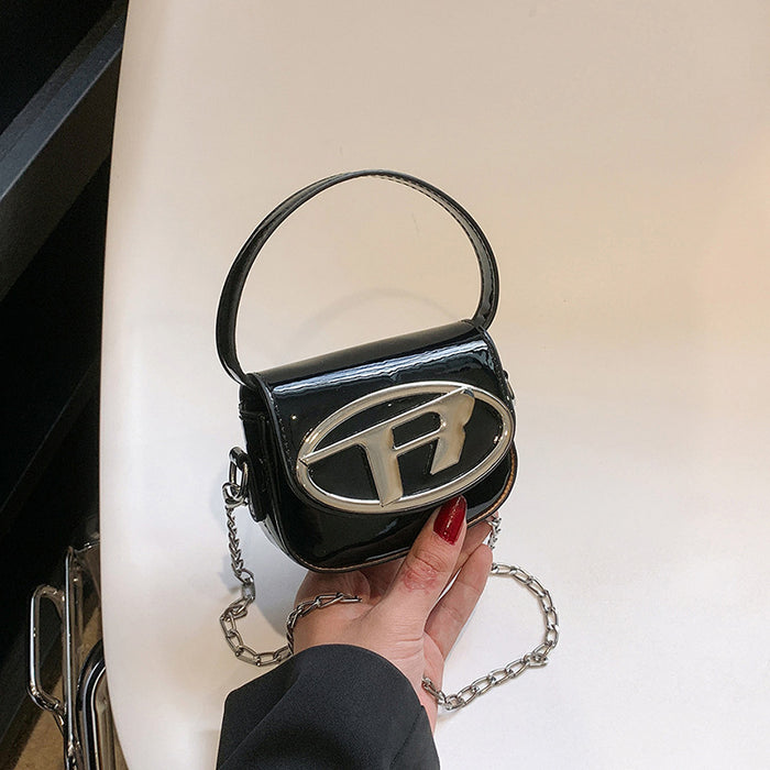 Wholesale New children's bag with glossy patent leather mini saddle bag, stylish women's chain crossbody bag, red envelope at the mouth