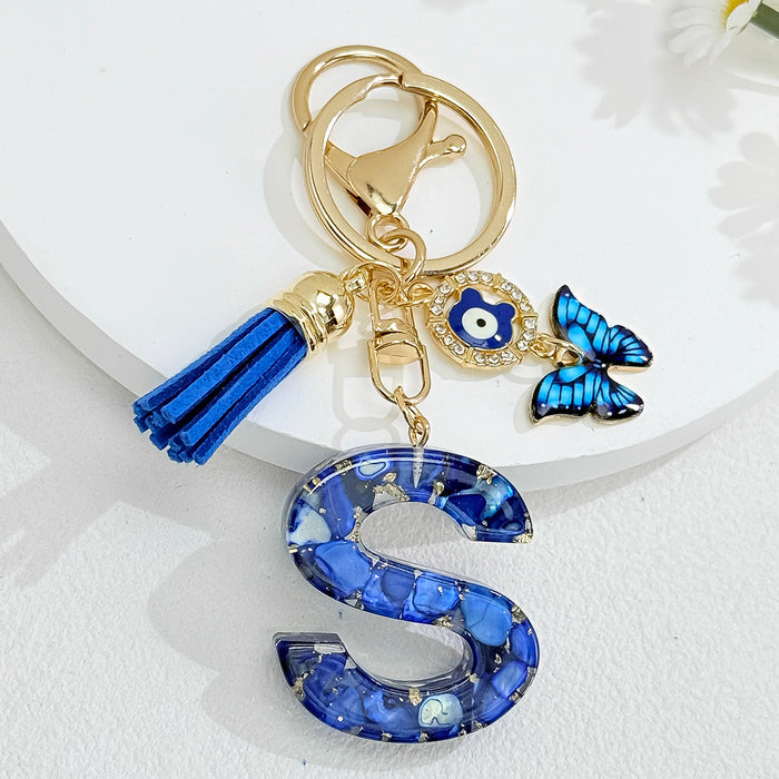 Wholesale Royal Blue 26 Letter Keychain with Evil Eye Butterfly Tassel Pendant