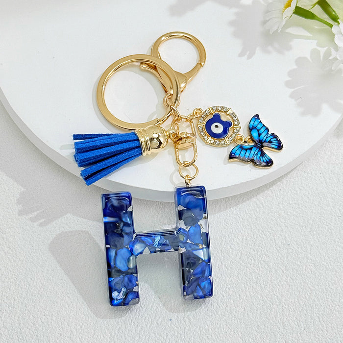 Wholesale Royal Blue 26 Letter Keychain with Evil Eye Butterfly Tassel Pendant