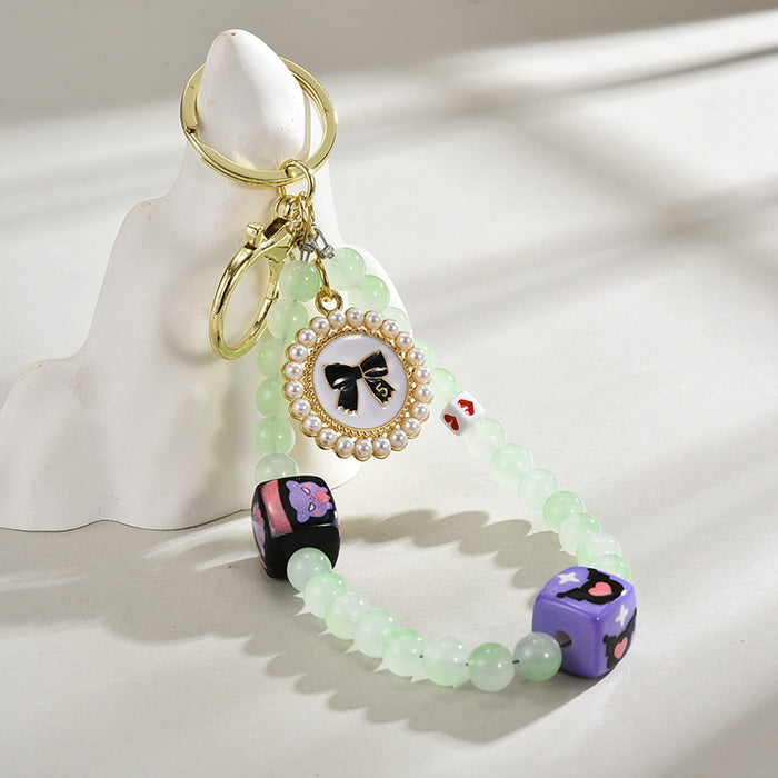 Wholesale Glass bead round brand bow keychain