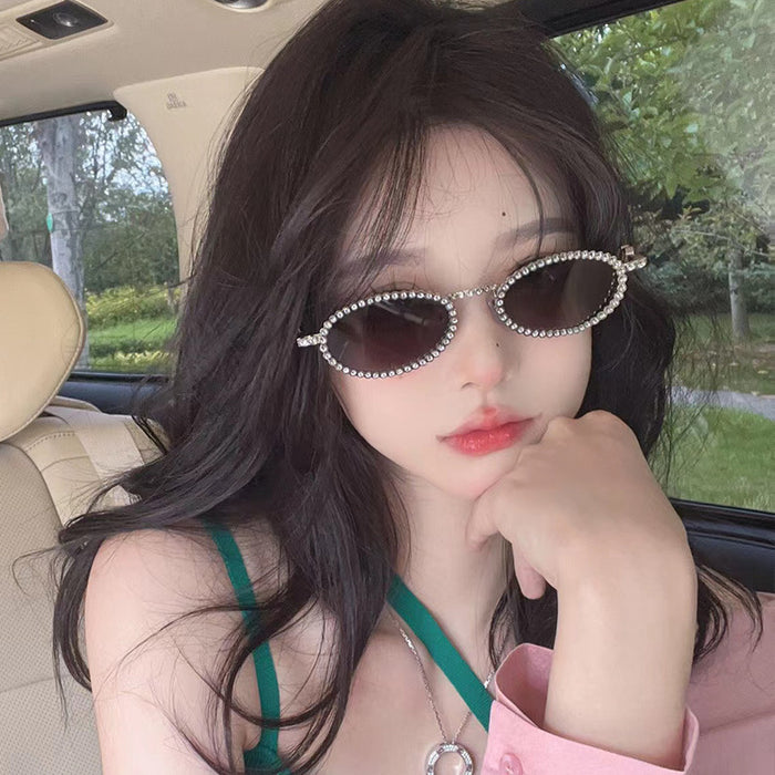 Wholesale Full diamond oval frame sunglasses for high-end photography, diamond studded sunglasses