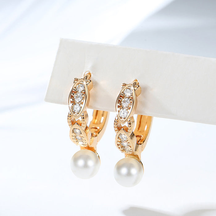 Wholesale Copper gold-plated retro light luxury simple pearl earrings, small and fashionable design, inlaid with zircon ear buckles, wholesale of ear accessories