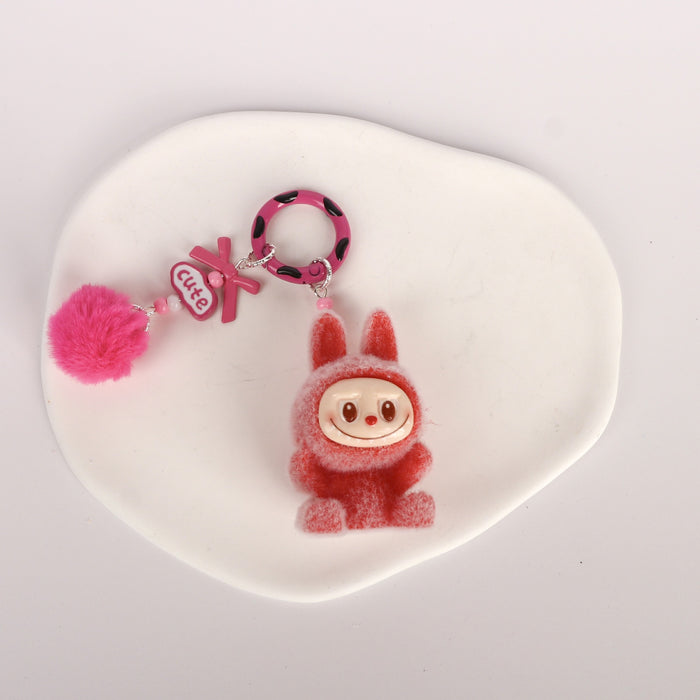 Wholesale Cute Sitting Flocking Keychain Bag Car Decoration Pendant Mobile Phone Chain Wholesale Small Gift