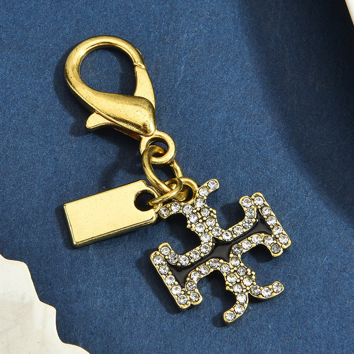 Wholesale Multi Style Dinosaur Clover Heart Animal Gold Alloy Keychain Pendant Fashion Jewelry Accessory