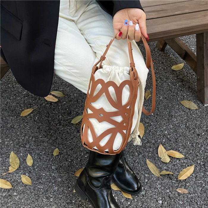 Wholesale  Autumn Street Style Hollow Cylinder Drawstring Bag Black P. U.  Medium Fashion Accessory