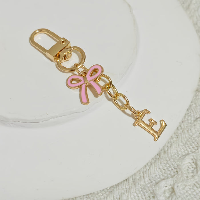 Wholesale Pink bow A-Z keychain alloy accessory