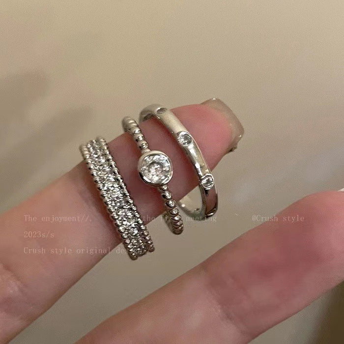 Wholesale Set of open-faced diamond-encrusted heart-shaped rings.