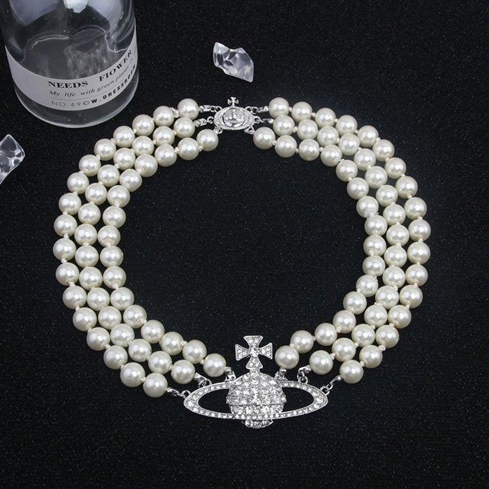 Wholesale Saturn-set diamond three-strand pearl necklace