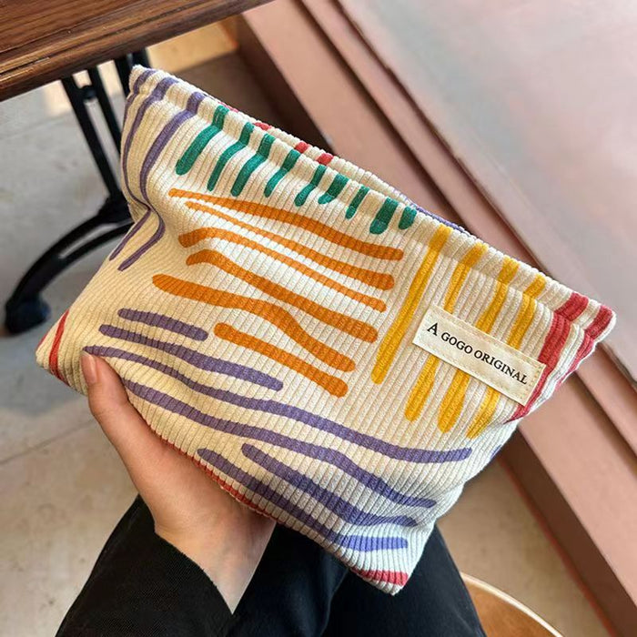Wholesale Corduroy contrasting striped makeup bag for portable travel and business trips