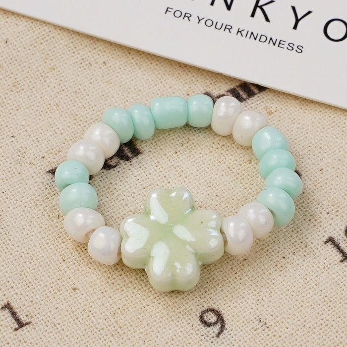 Wholesale New Ceramic Flower Ring Wholesale Student Versatile Handpiece