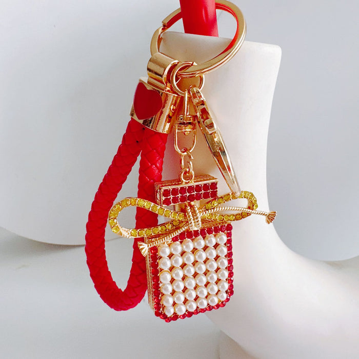 Wholesale Alloy Diamond Tassel Bow Pearl Perfume Bottle Keychain JDC-KC-ZhanLun017