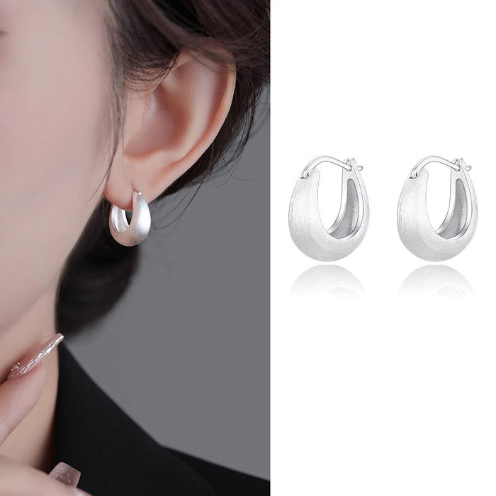 Wholesale Brushed silk ring earrings with temperament, ear buckles with a niche and high-end feel, silver needle earrings, and new earrings