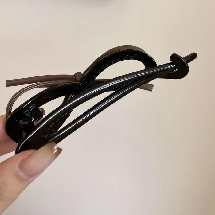 Wholesale Temperament leather bow twist clip hair with a high-end feel, straight clip headband accessory