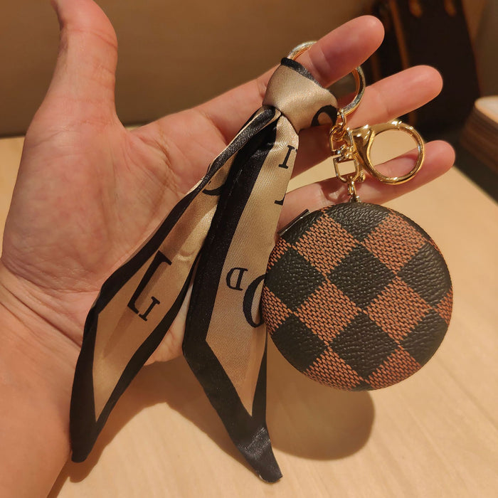 Wholesale light luxury and exquisite presbyopic leather cosmetic mirror key chain pendant double-sided mirror bag pendant JDC-KC-JiYou007