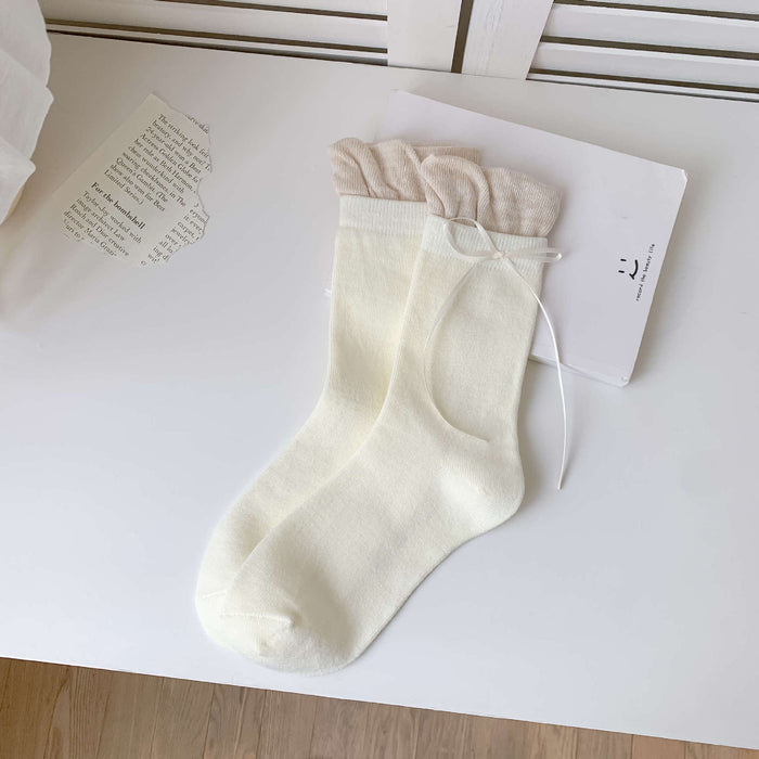 Wholesale Butterfly knot pile socks, cute and versatile pile socks