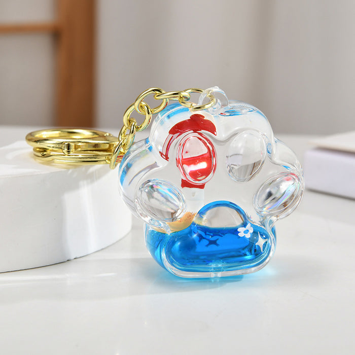 Wholesale Acrylic sailboat lighthouse blue oil-filled quicksand bottle keychain