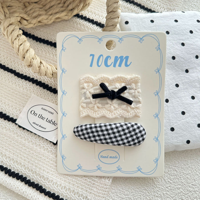 Wholesale Sweet bow hair clip with water droplets, wavy dots, children's fabric, side broken hair, wavy dots, bangs clip