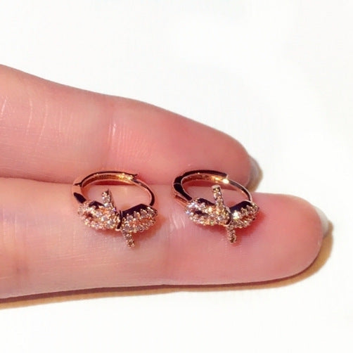 Wholesale Subtle high-end ear buckle earrings with simple zirconium inlay bow temperament earrings for women