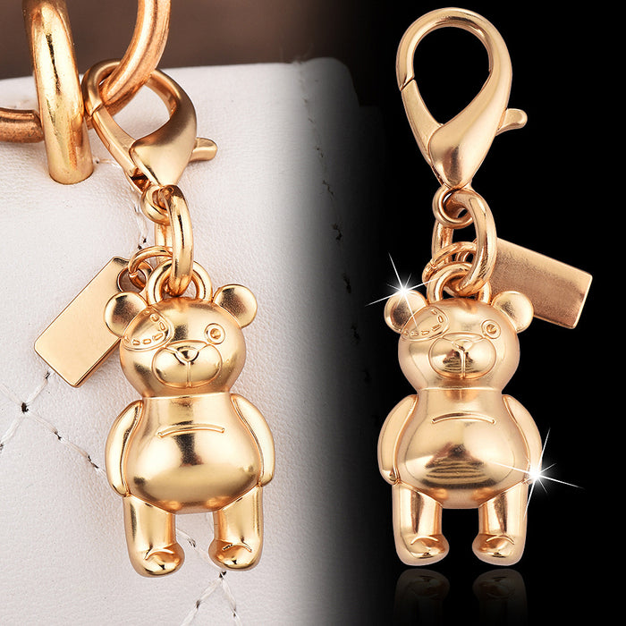 Wholesale Car key pendant high sense bag accessories gold color bear cherry four-leaf clover butterfly schoolbag jewelry