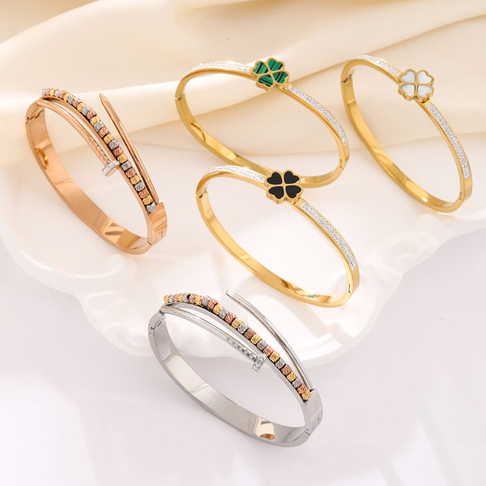 Wholesale Four-leaf clover titanium steel gold-plated bracelet